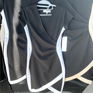 Beautiful, classic, dresses, brand new. S, M. Black and white, Black and tan.
